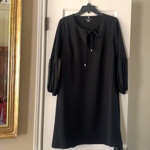 Black dress, knee length